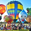 台中天空驚現巨型蜜柑狗狗！石岡熱氣球嘉年華8/29登場，15顆造型球飛躍山城